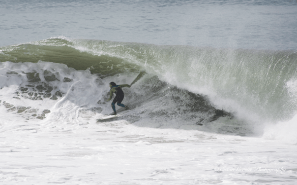 surfer riding big wave, Redondo Beach, CA